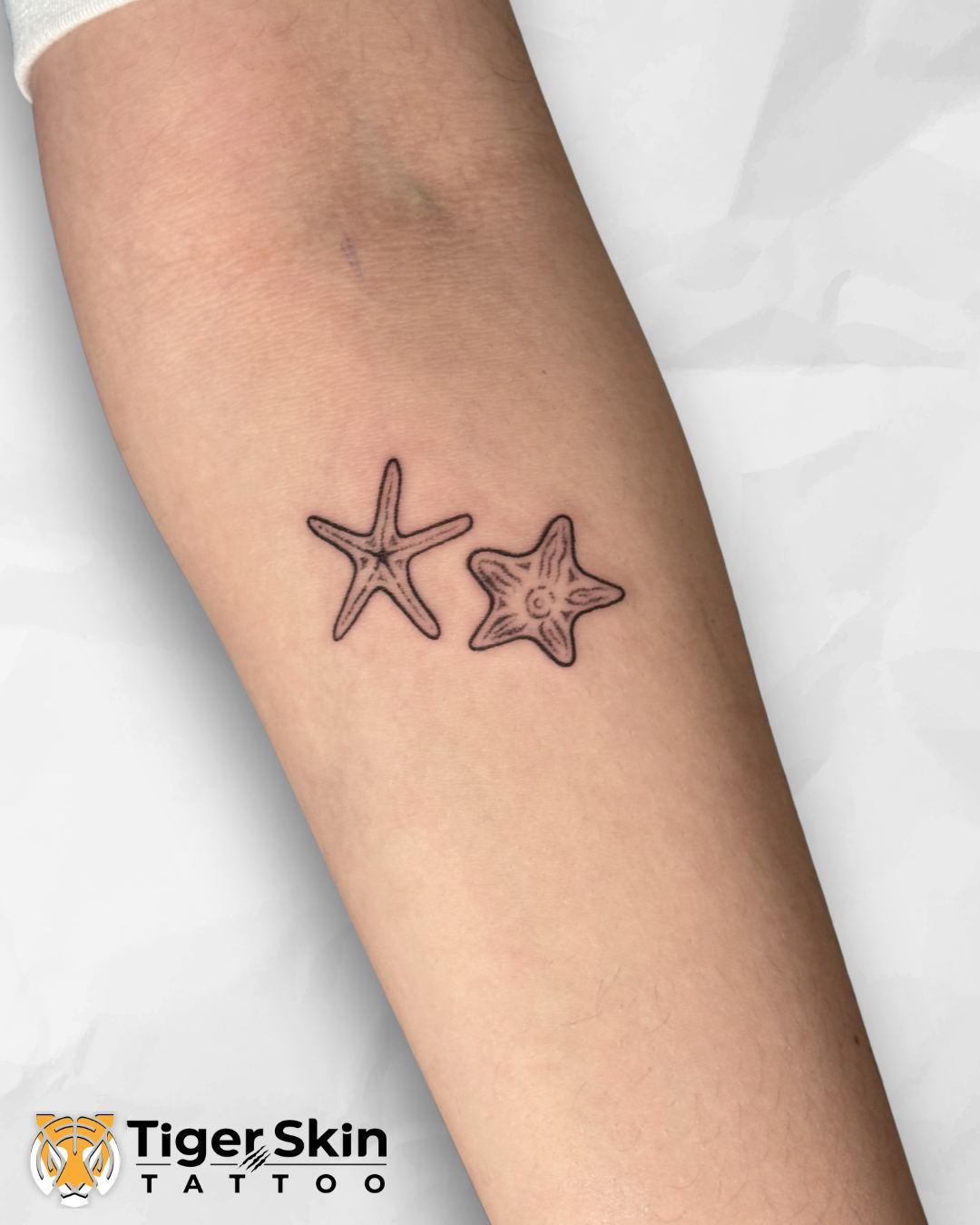 Fine line tattoo in Thane by Tiger Skin
